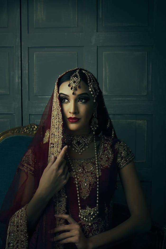 Photo of Woman Wearing Red Sari